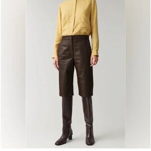 COS size 4 brown lambskin leather shorts, 2 pockets in front, 1 pocket in back.